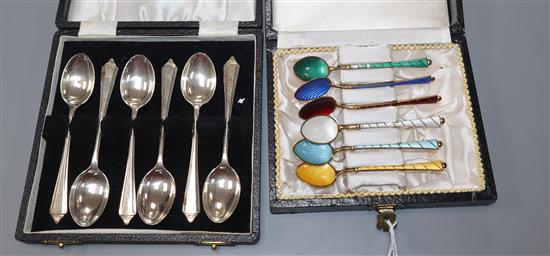 Two cased sets of six tea/coffee spoons including Danish gilt white metal polychrome enamel set and an English silver set.